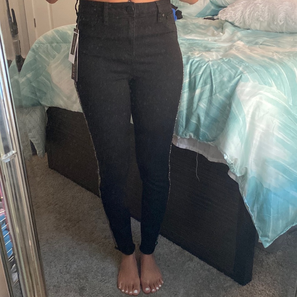 Black jeans with rhinestones down the sides